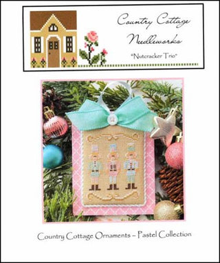 Pastel Ornament Part 2: Nutcracker Trio Cross Stitch Pattern by Country Cottage Needleworks - Premium Pattern, Cross Stitch from Country Cottage Needleworks - Just $7! Shop now at Crossed Hearts Needlework & Design